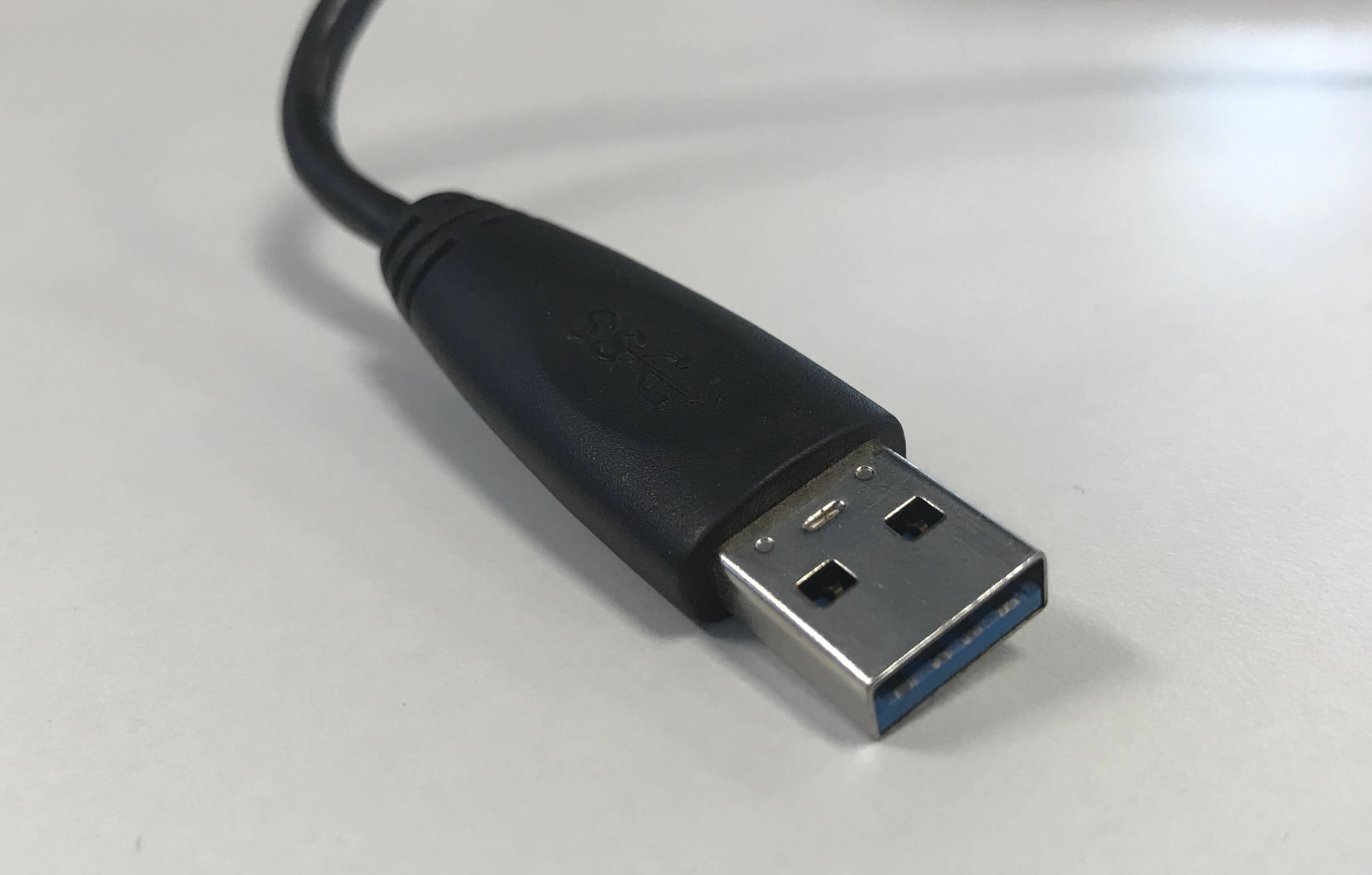 Picture of a USB A cable on a white table