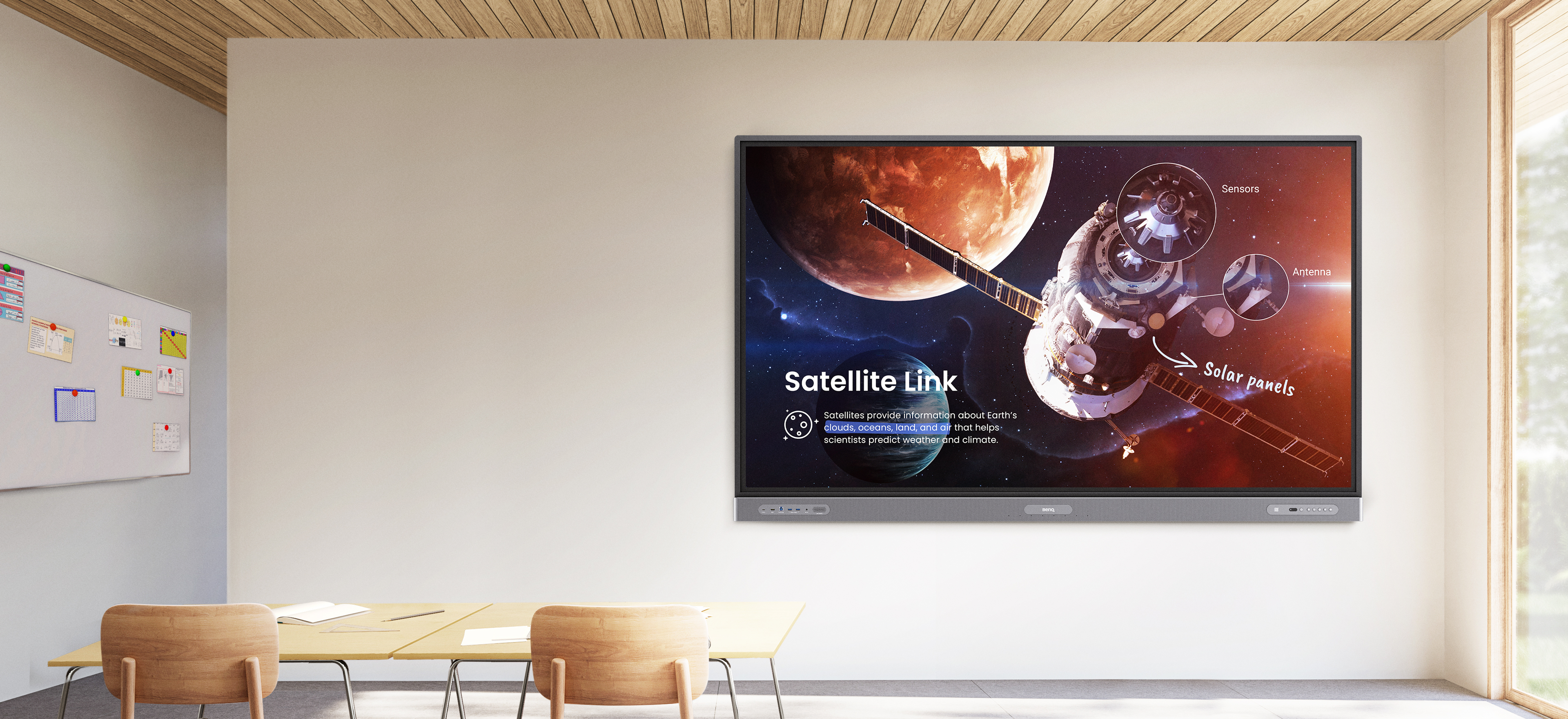 4K UHD BenQ Pro Series interactive display in a bright, empty classroom